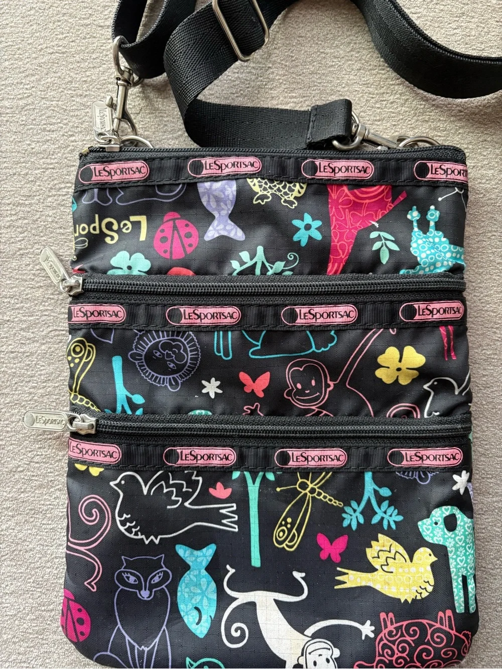LeSportsac Black Crossbody with Colorful Animal & Floral Print